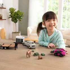 ERTL 1/32 CASE SV340B Skid Steer On Flatbed Trailer With RAM Pickup & Accessories, ZFN47431